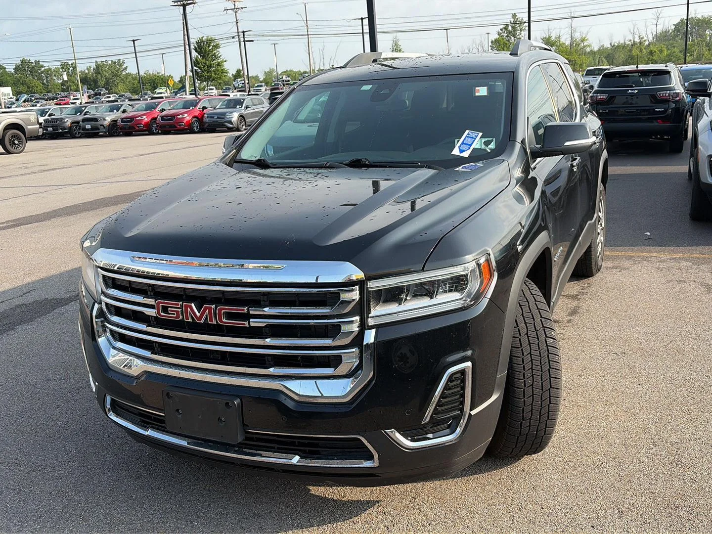 Used 2021 Ebony Twilight Metallic GMC SLE image 4