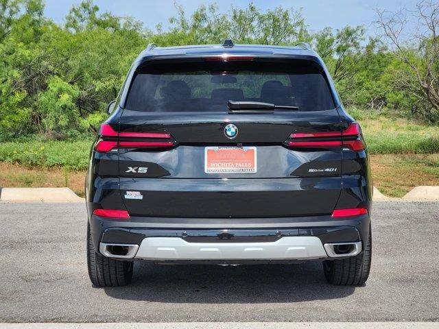 Used 2026 Black Sapphire BMW sDrive40i 4x2 Sports Activity Vehicle image 6