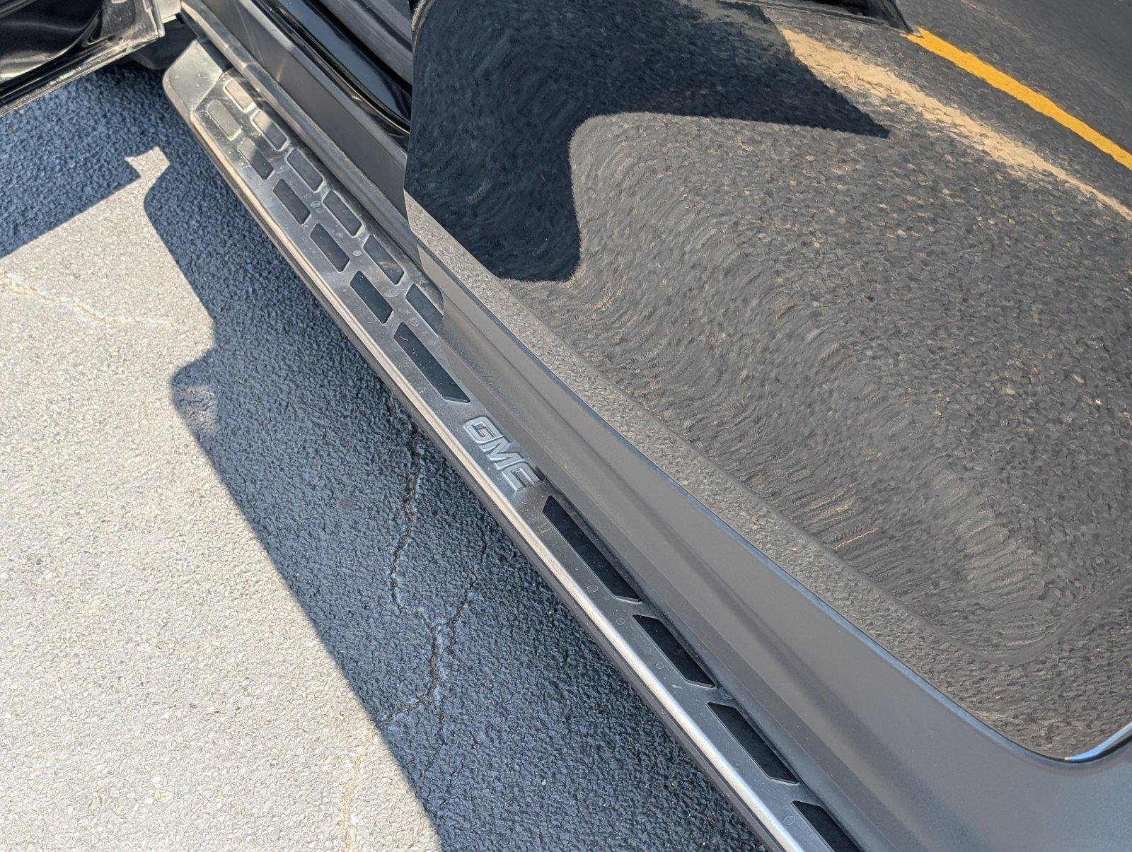 Used 2023 EBONY TWILIGHT METALLIC GMC AT4 image 11