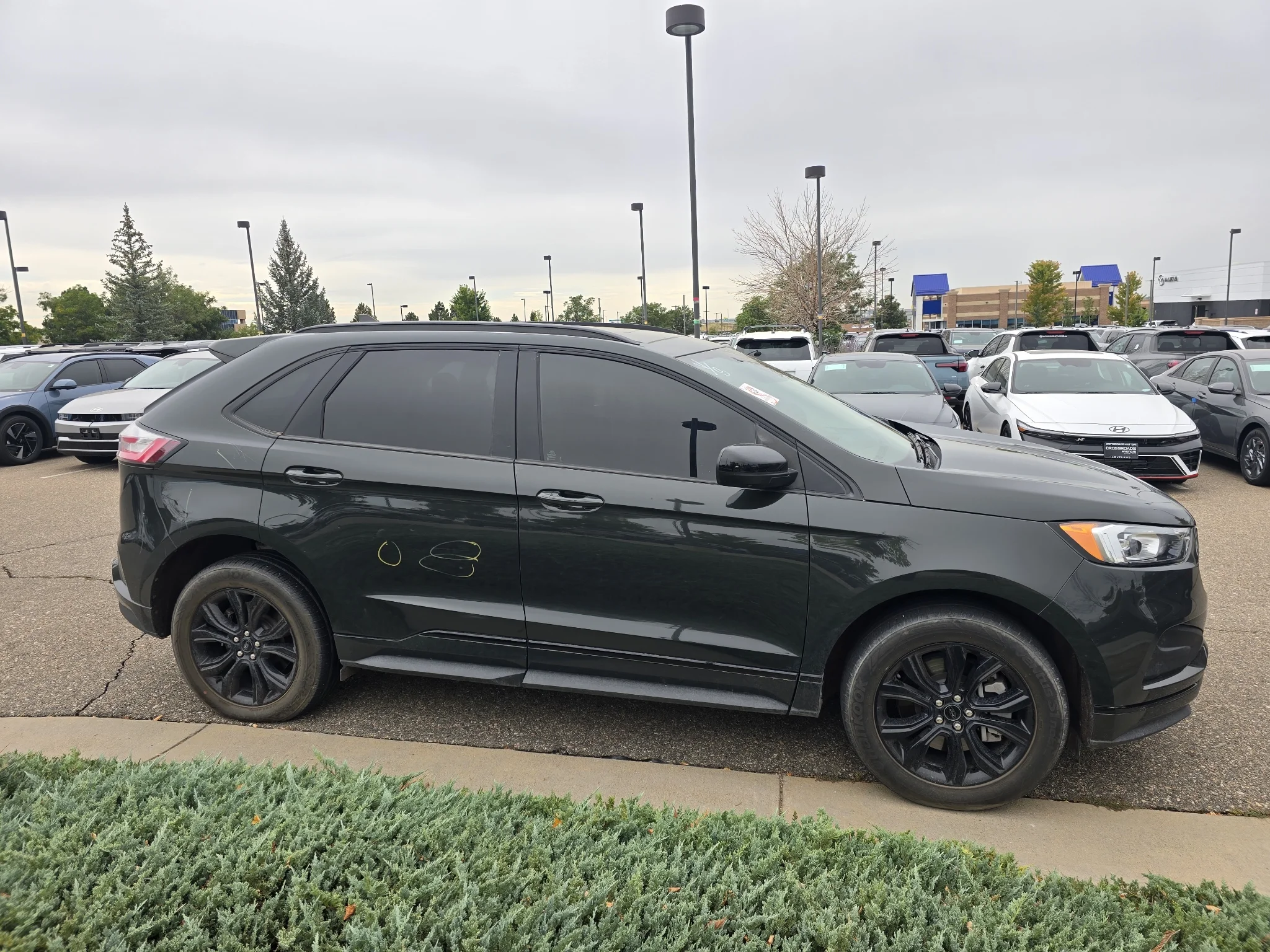 Used 2024 Forged Green Metallic Ford SE image 7
