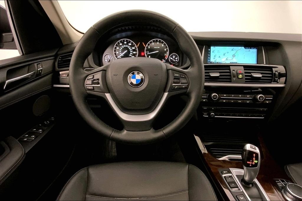 Used 2017 Deep Sea Blue Metallic BMW  image 4