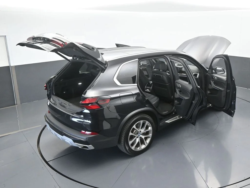Used 2025 Black Sapphire Metallic BMW xDrive50e image 74