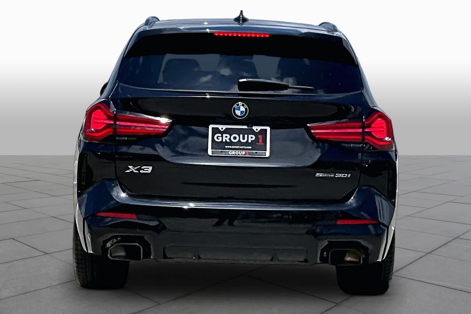 Used 2023 Black Sapphire Metallic BMW sDrive30i image 4
