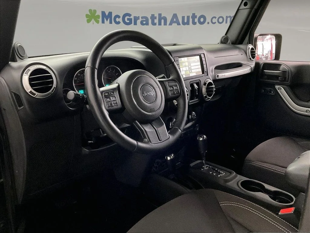 Used 2013 Black Jeep Unlimited Sahara image 17
