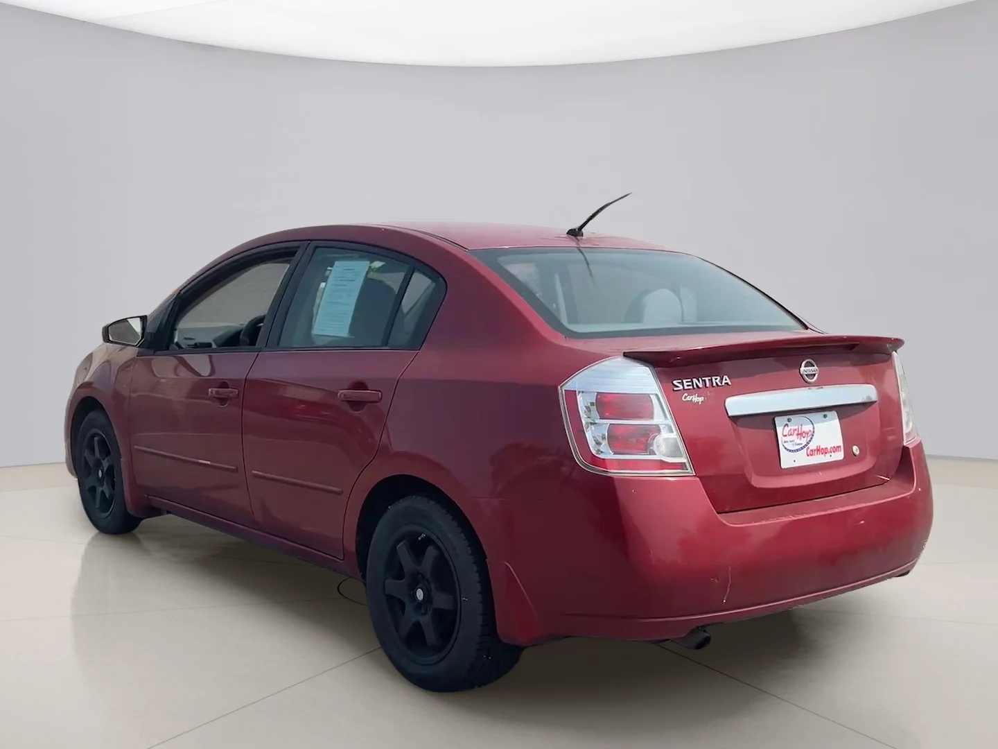 Used 2012 Red Nissan SEDAN image 4