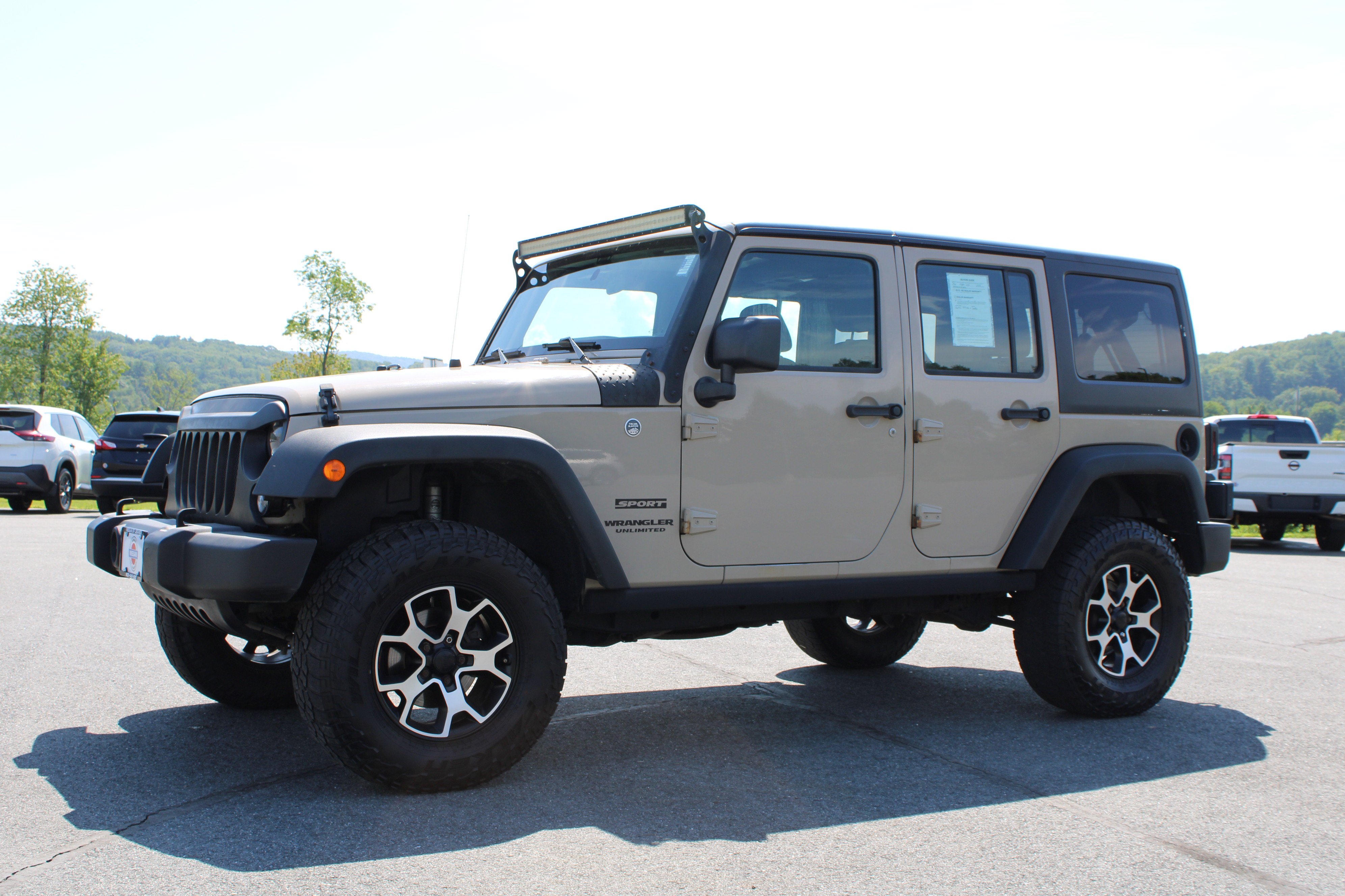 Used 2016 Mojave Sand Clearcoat Jeep Sport image 14