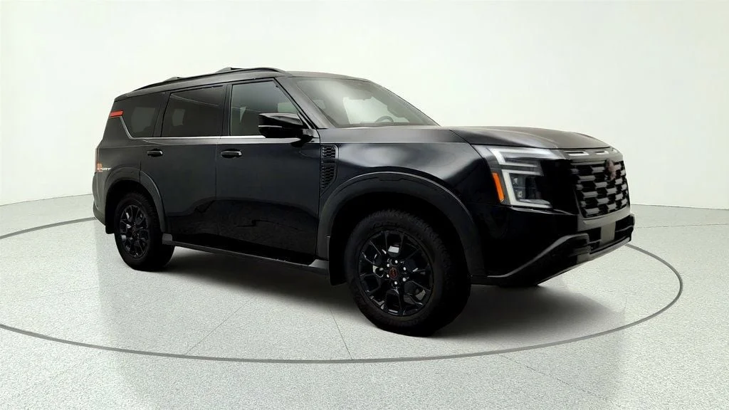 Used 2025 Super Black Nissan 4x4 PRO-4X w/ Cross Bars image 3