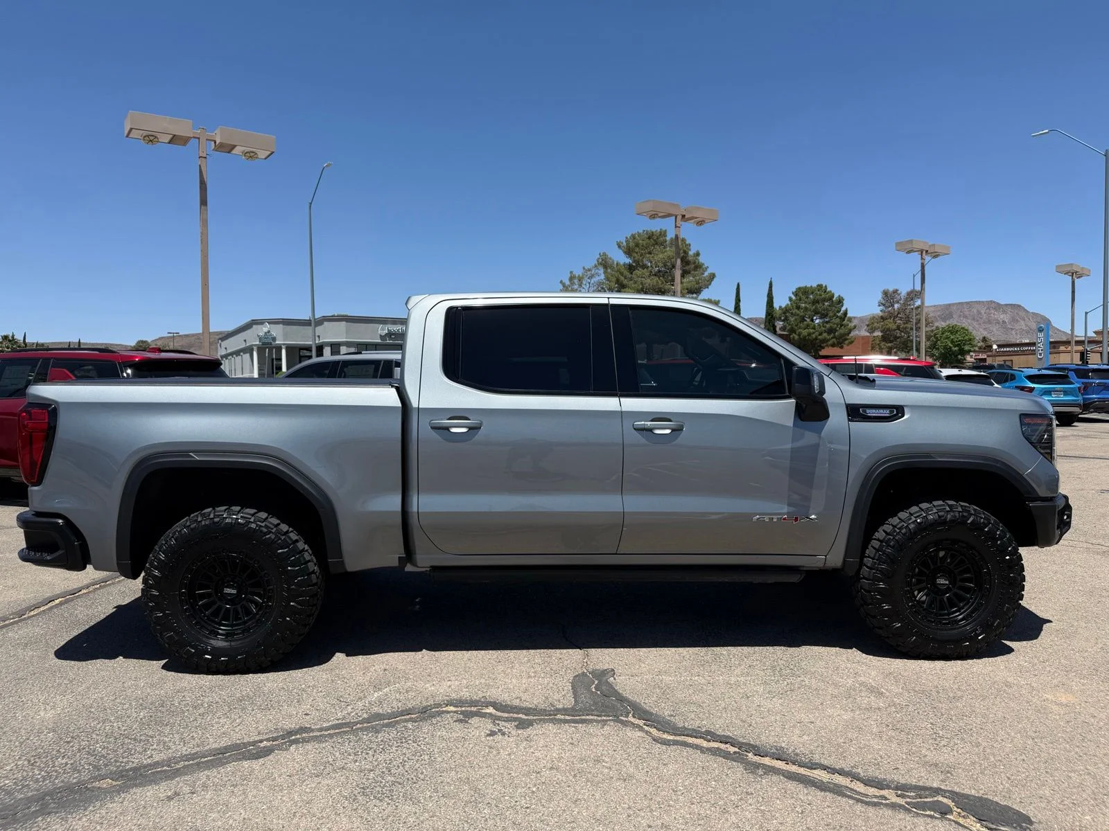 Used 2024 Silver GMC AT4X image 4