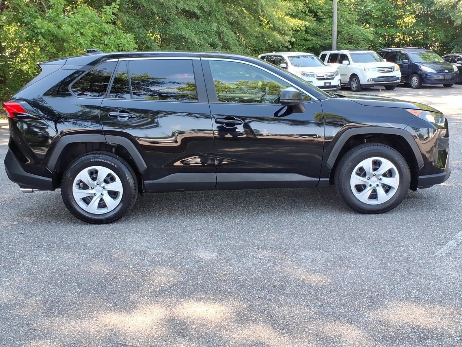 Used 2022 Midnight Black Metallic Toyota LE image 8