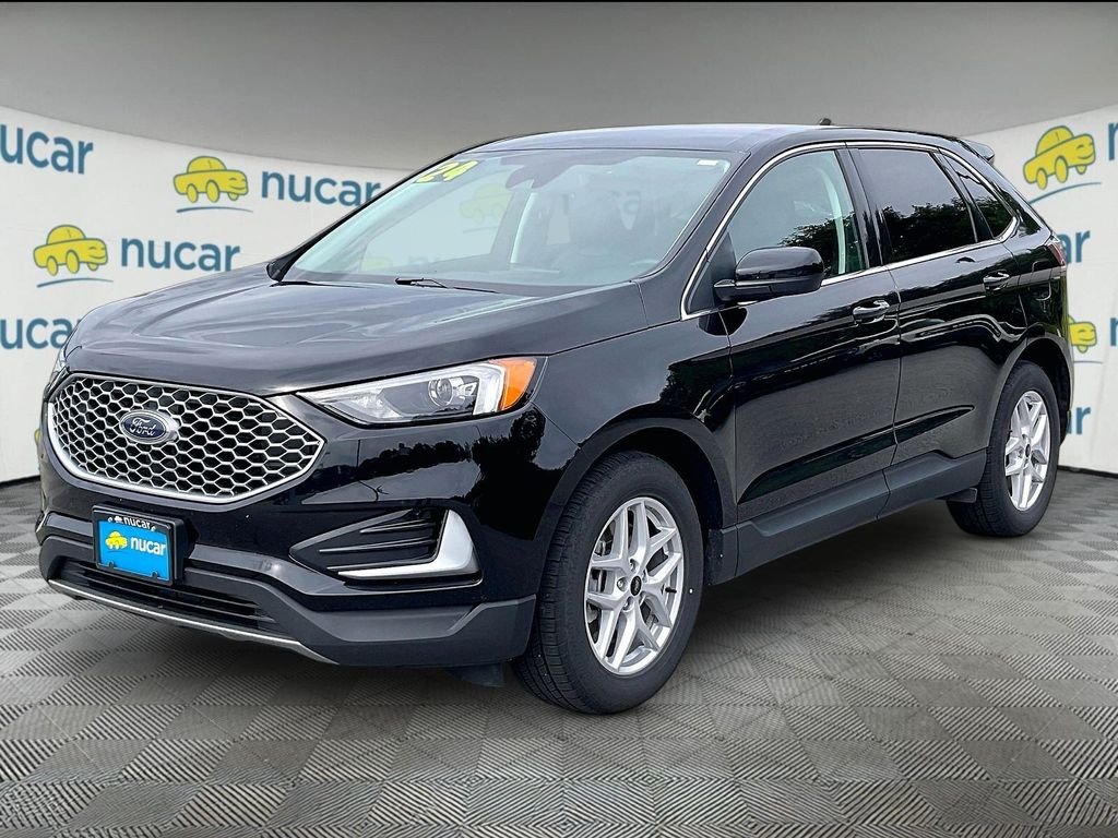 Used 2024 Agate Black Metallic Ford SEL image 3