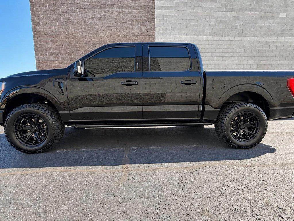 Used 2023 Agate Black Metallic Ford LARIAT 4WD SUPERCREW 5.5 BOX image 7