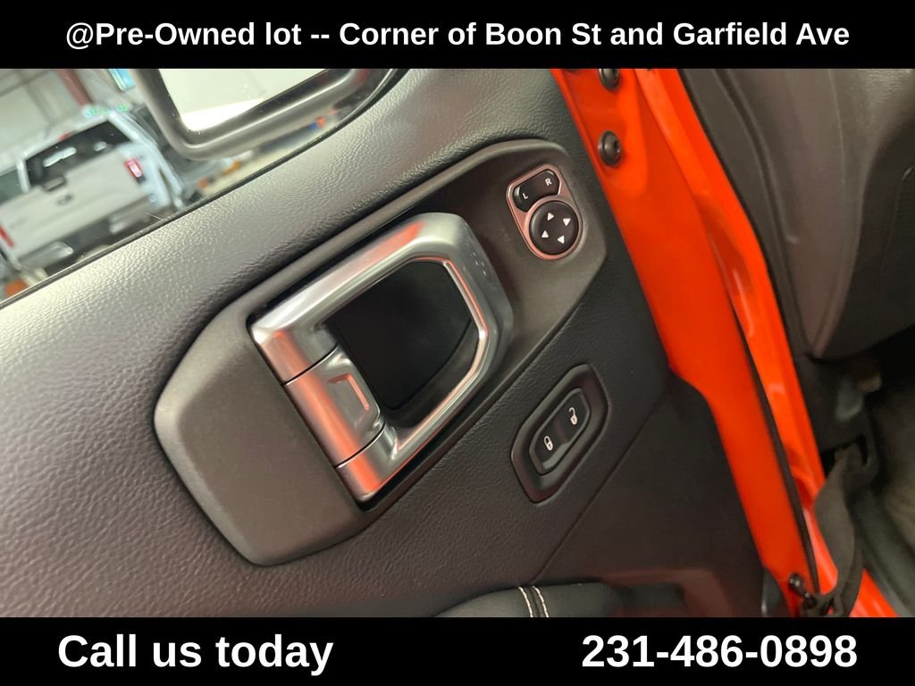 Used 2018 Orange Jeep Unlimited Sahara image 16