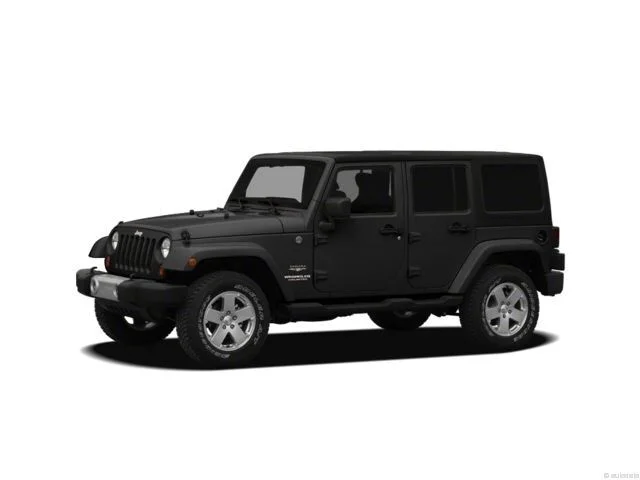 Used 2012 Black Jeep Unlimited Sport image 1