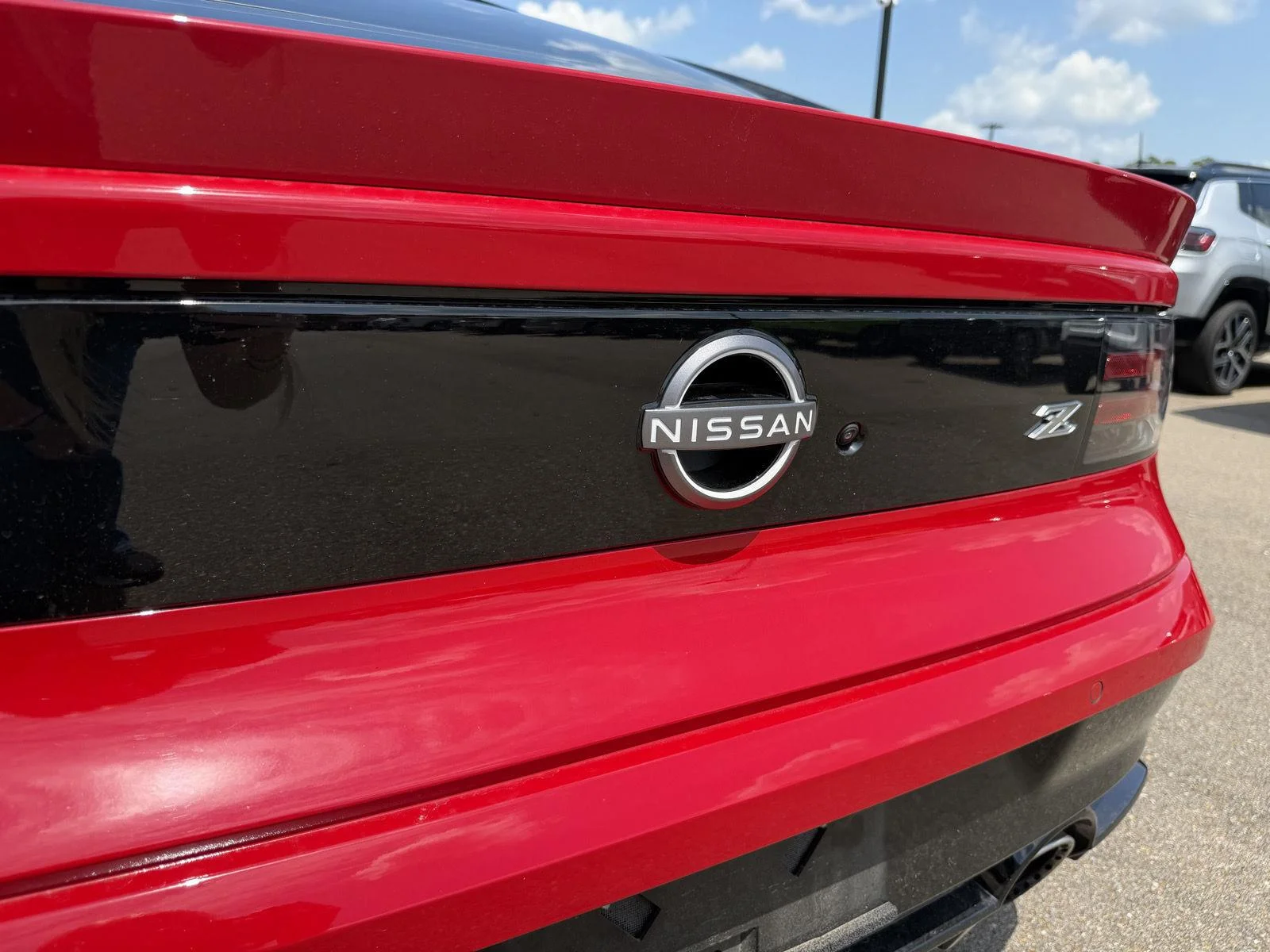 Used 2025 Solid Red/Super Black Nissan Performance image 23