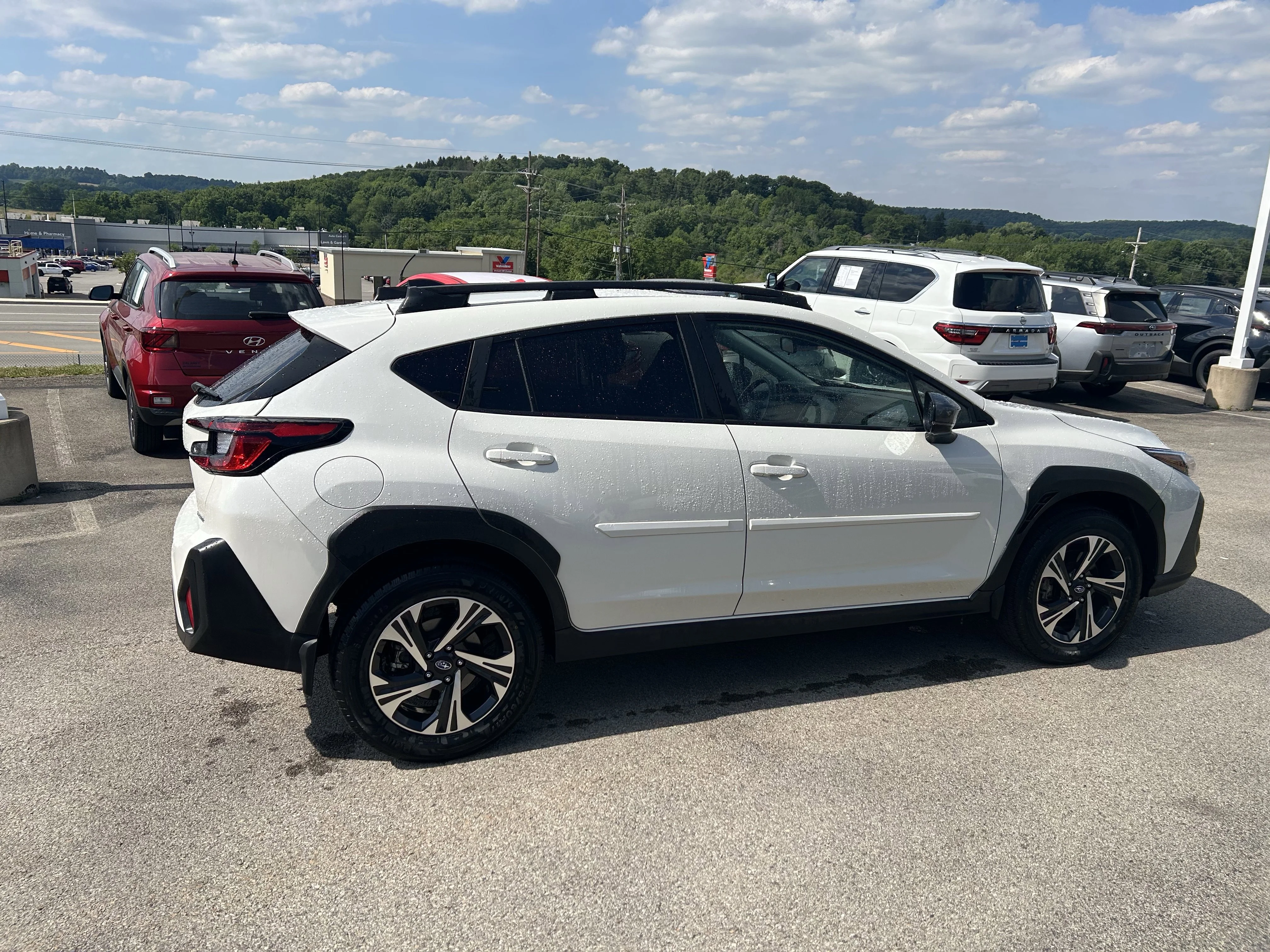 Used 2024 Crystal White Pearl Subaru Premium image 4