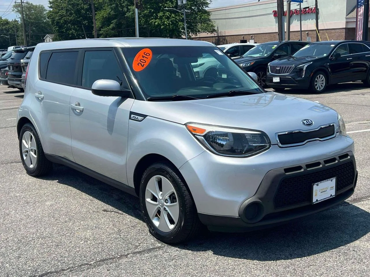 Used 2016 Bright Silver Kia Base image 1