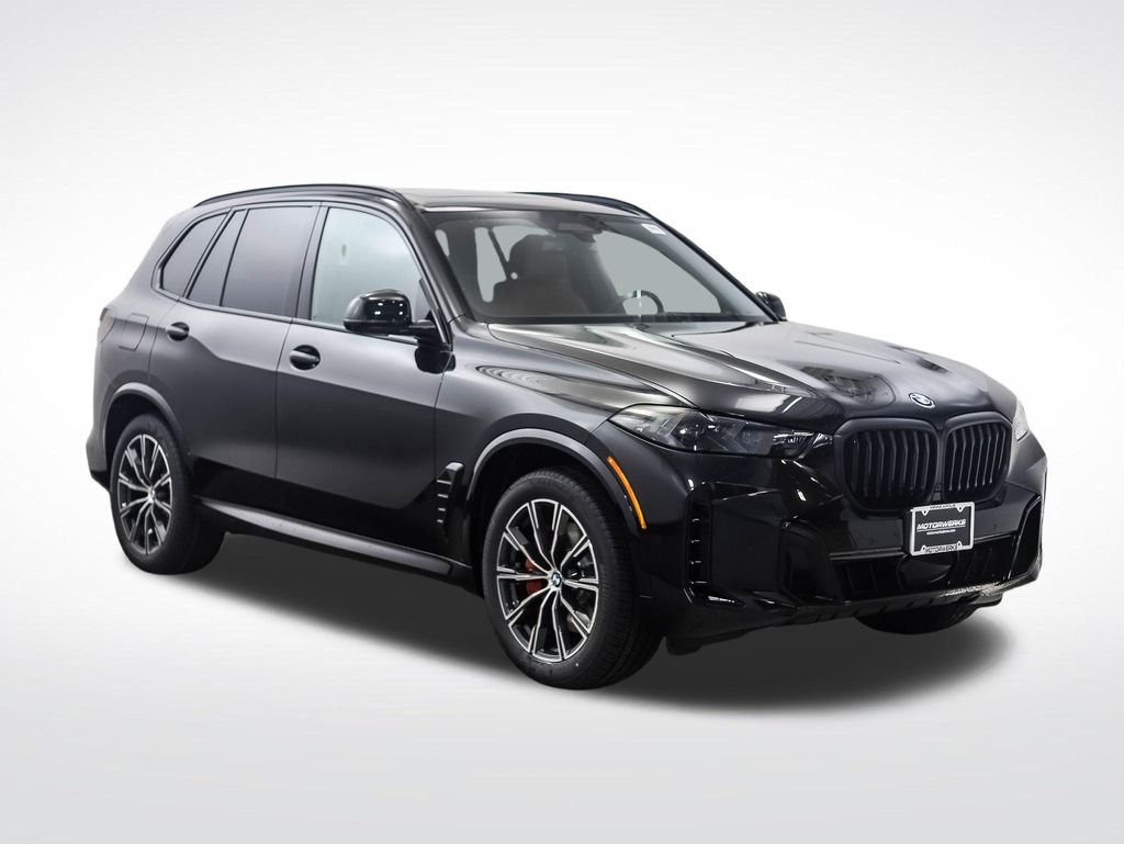 New 2026 Black Sapphire Metallic BMW xDrive40i image 7