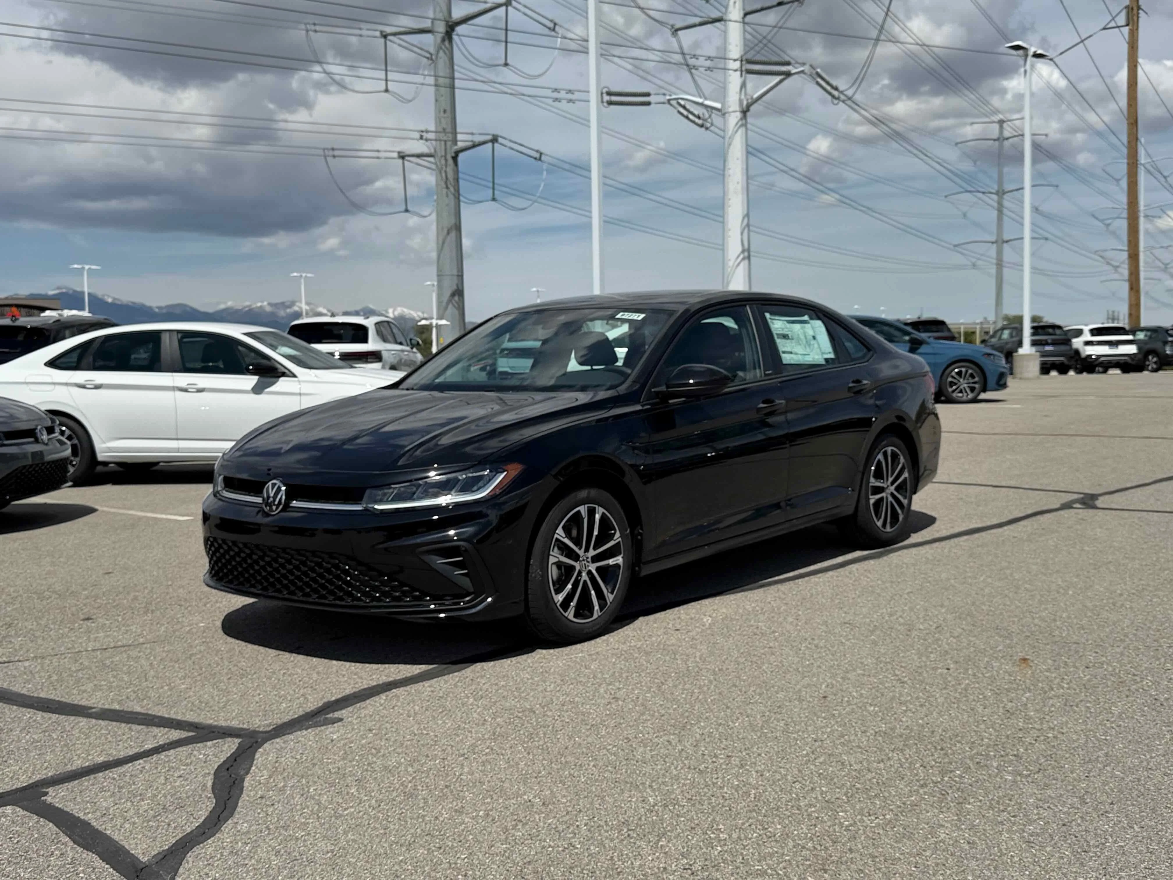 New 2026 Deep Black Volkswagen Sport image 1