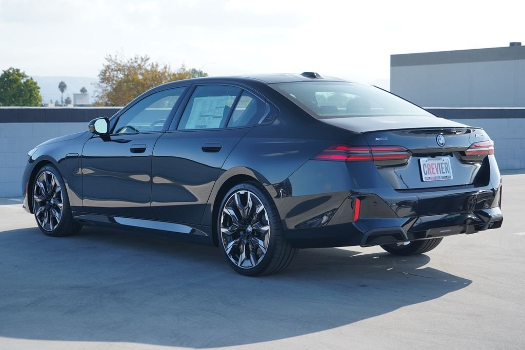 New 2027 Black Sapphire Metallic BMW 550e xDrive image 10