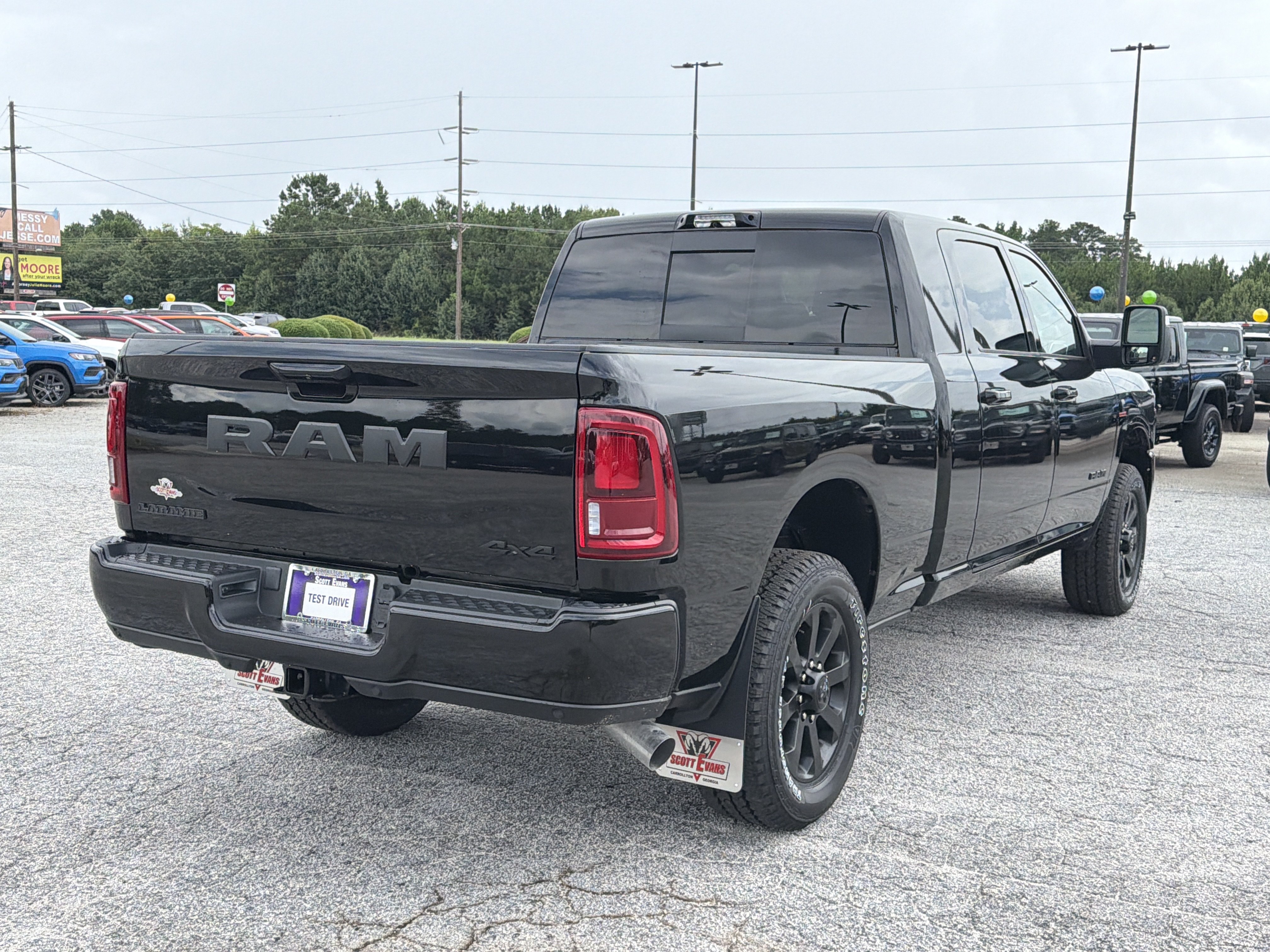 New 2026 Diamond Black Crystal Pearl-Coat Exterior Paint RAM Laramie image 8