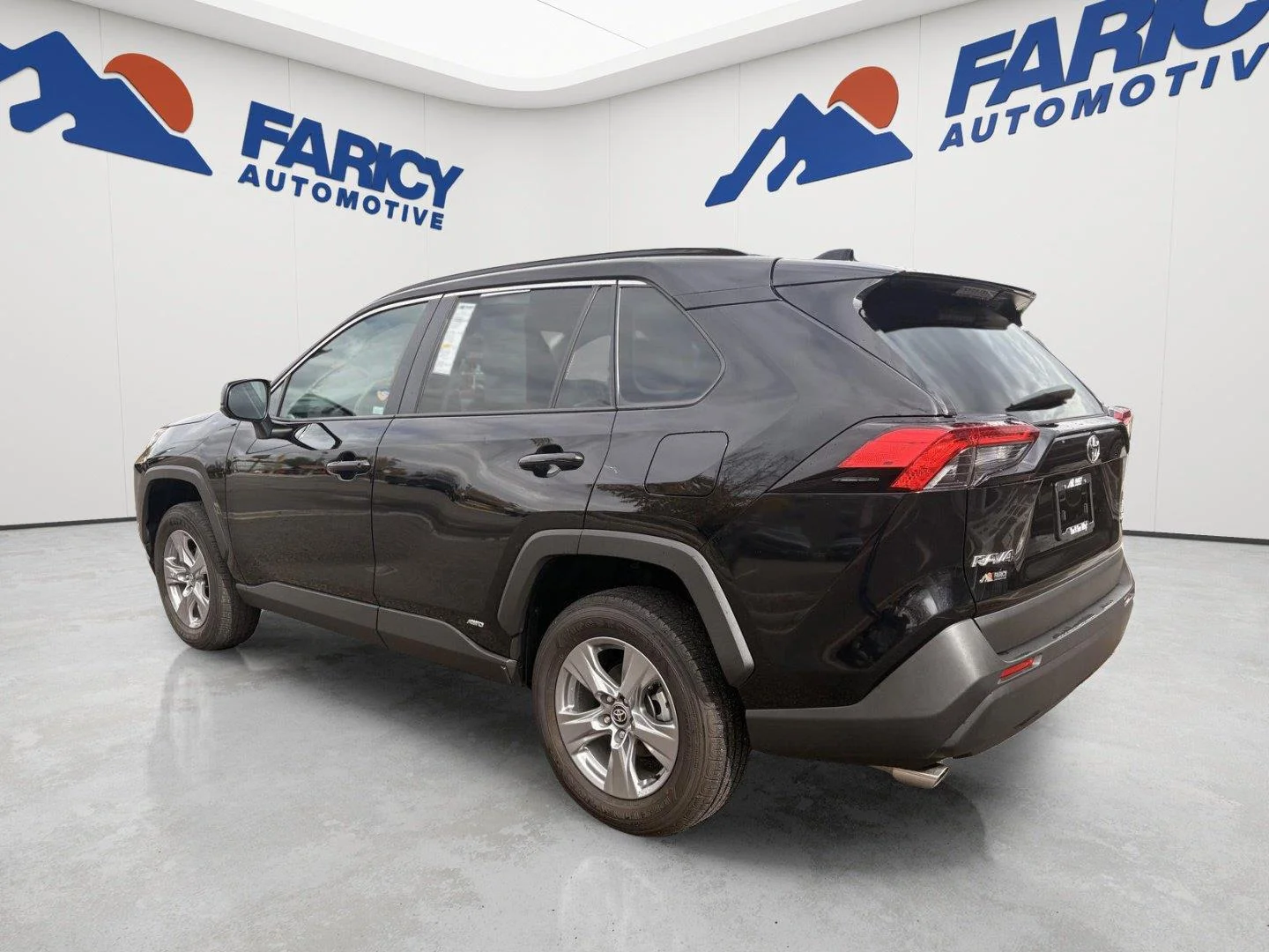 Used 2025 Midnight Black Metallic Toyota Hybrid LE image 3