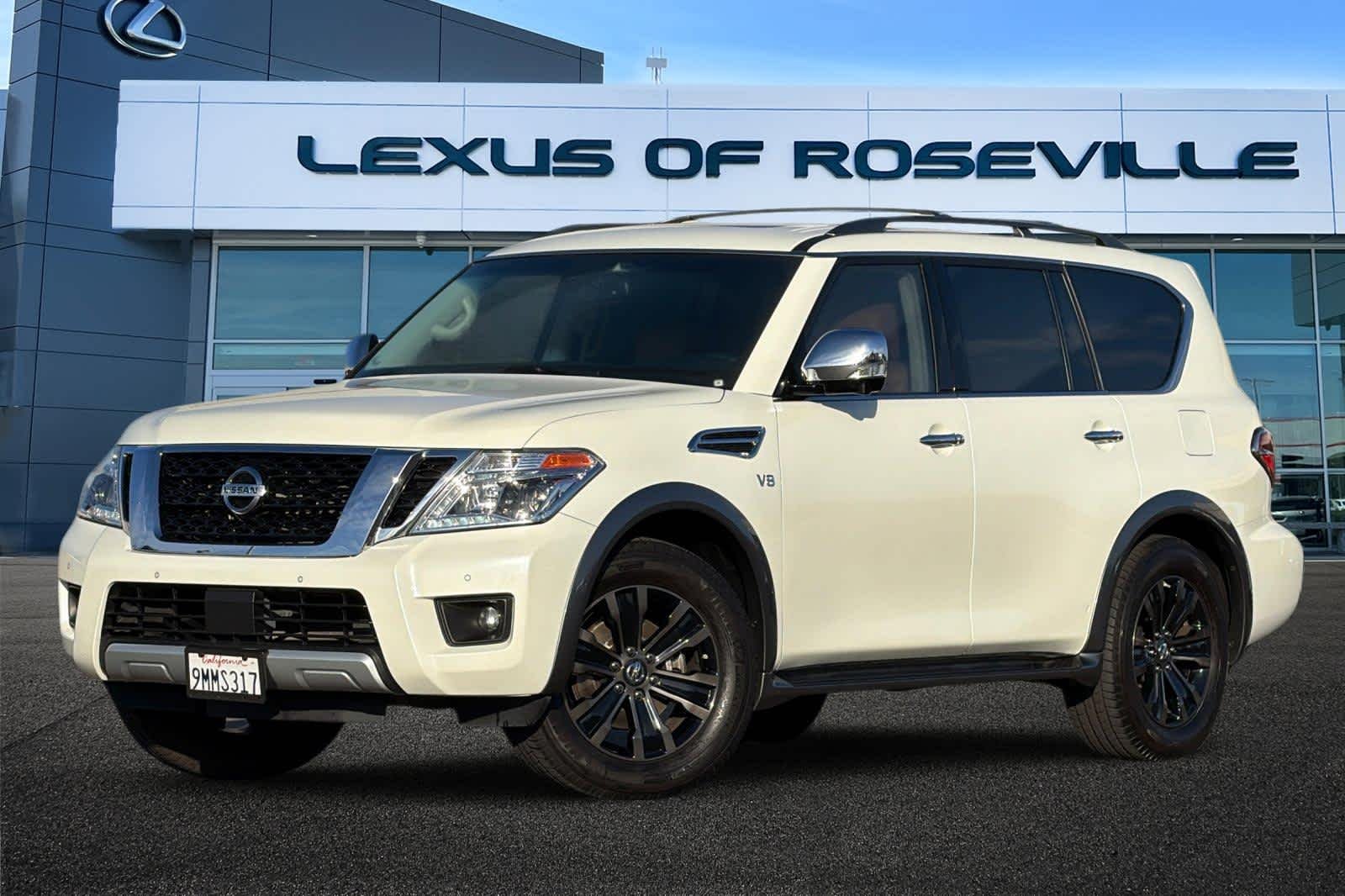 Used 2017 Pearl White Nissan Platinum image 1