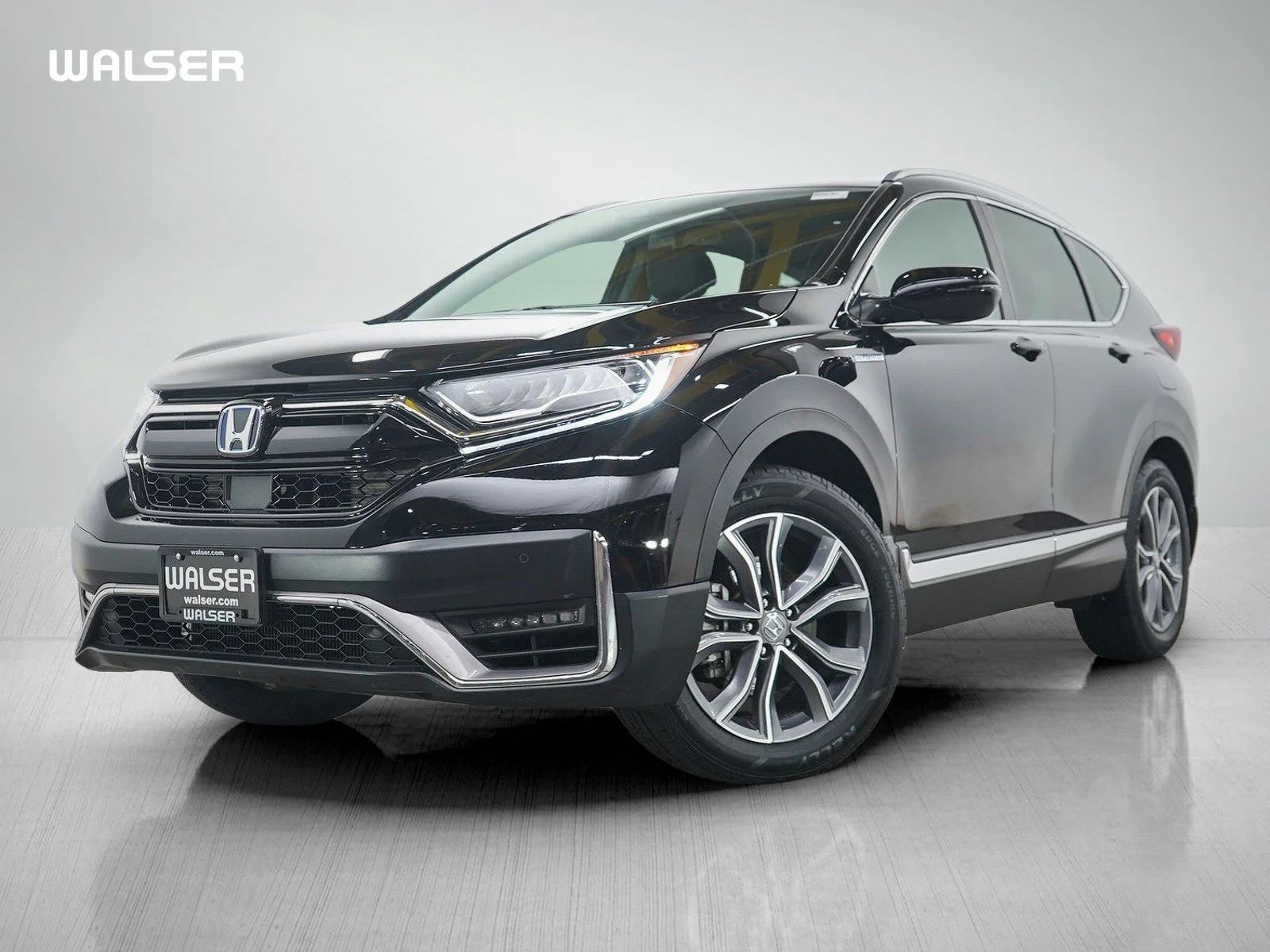 Used 2022 Black Honda 5D WAGON HYBRID TOURING image 1