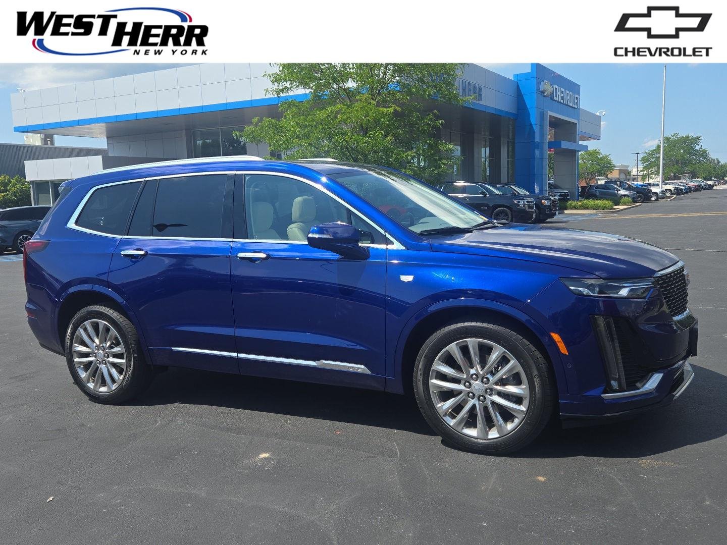 Used 2023 Opulent Blue Metallic Cadillac AWD Premium Luxury image 1