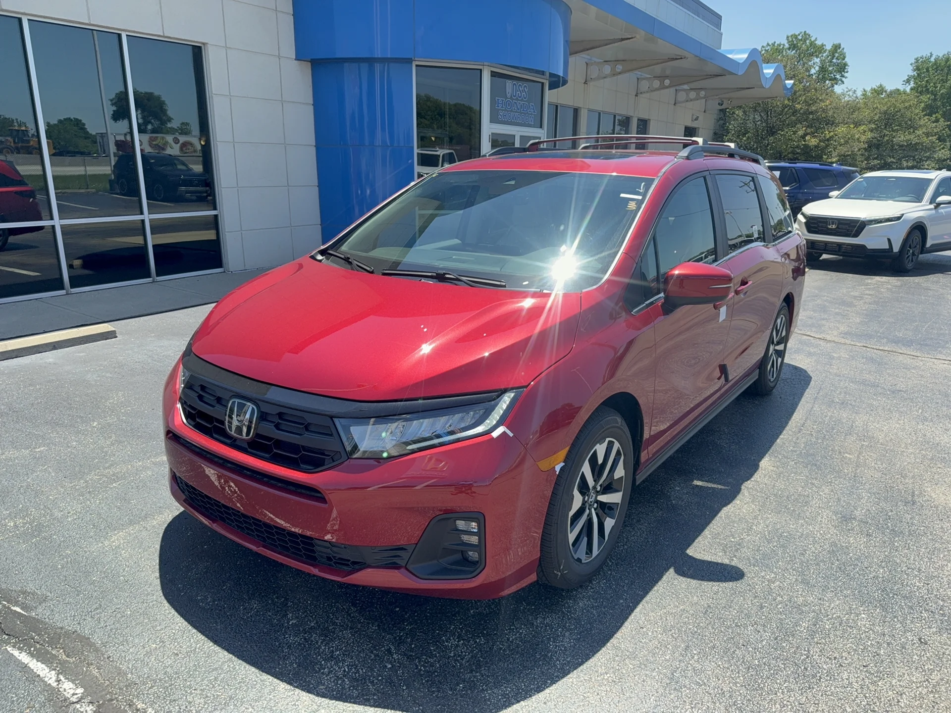 New 2026 Radiant Red Metallic II Honda EX-L image 1