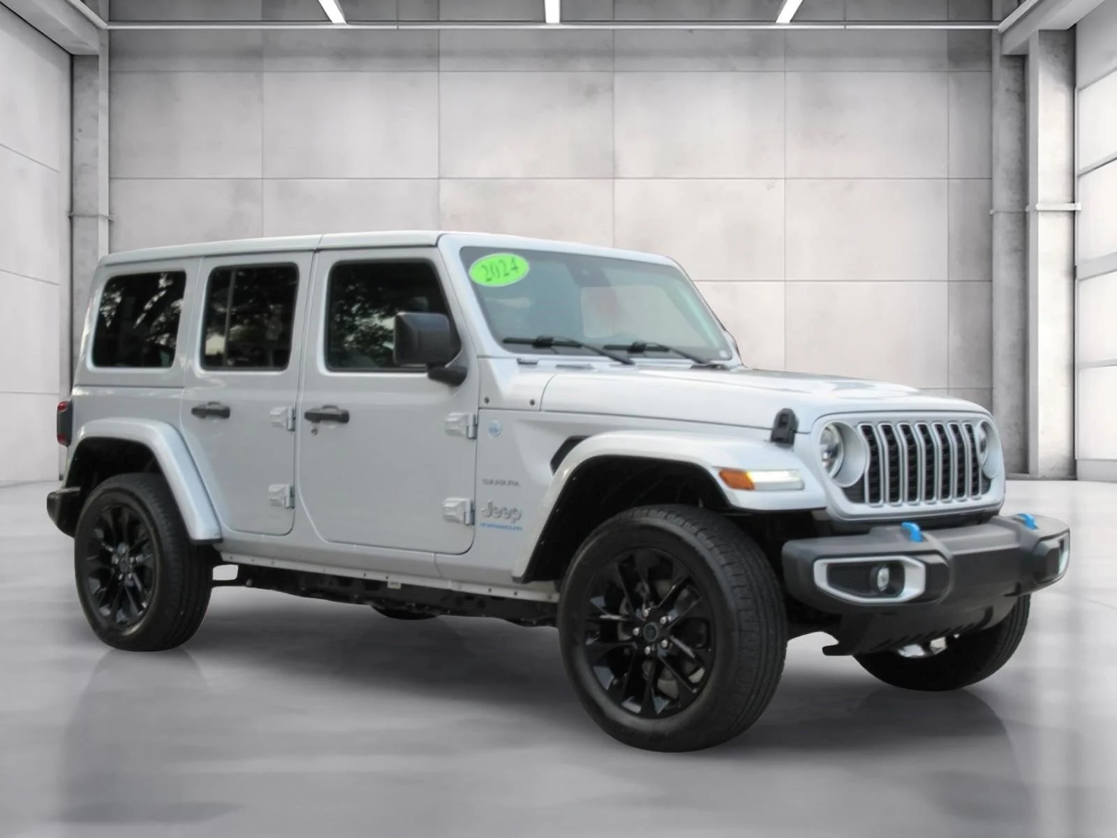 Certified Used 2024 Silver Jeep Sahara 4xe image 1