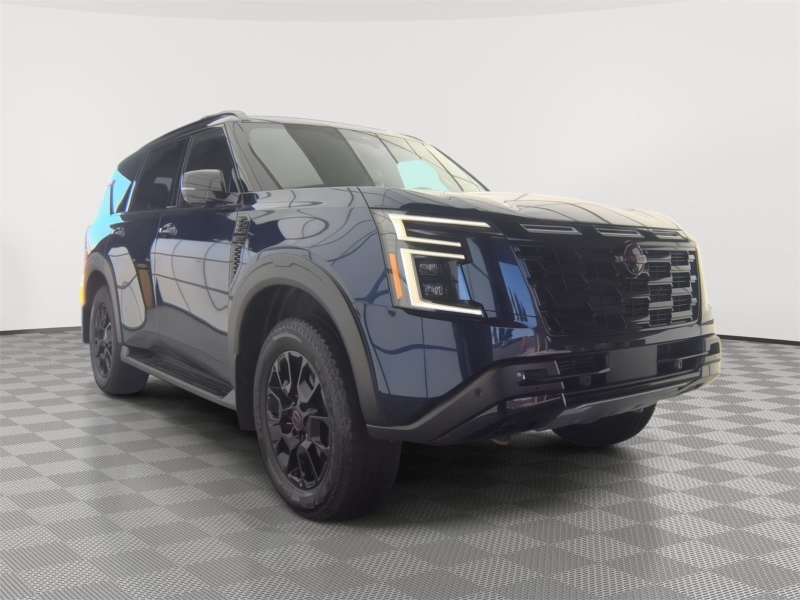 Used 2025 Deep Ocean Blue Pearl Nissan PRO-4X image 2