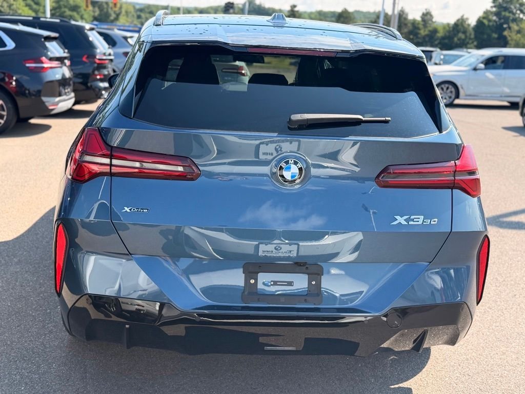 New 2026 Arctic Race Blue metallic BMW 30 xDrive image 4