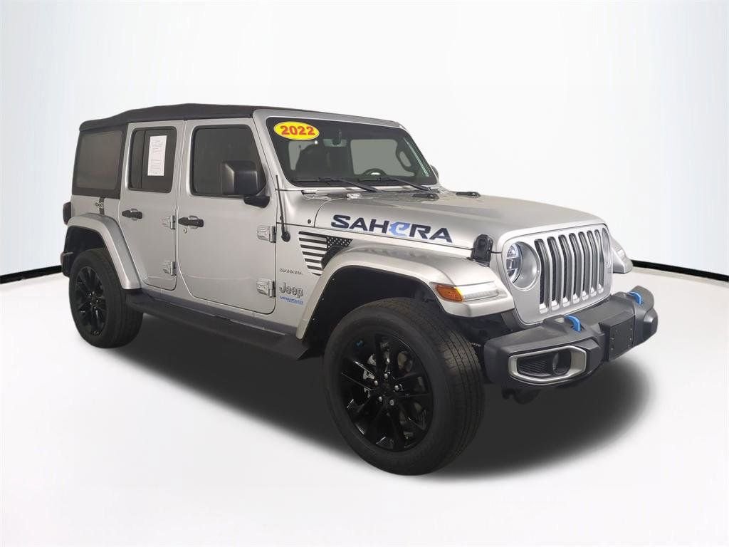 Used 2022 Jeep Wrangler Unlimited Sahara 4XE with VIN 1C4JJXP68NW228191 for sale in Tampa, FL