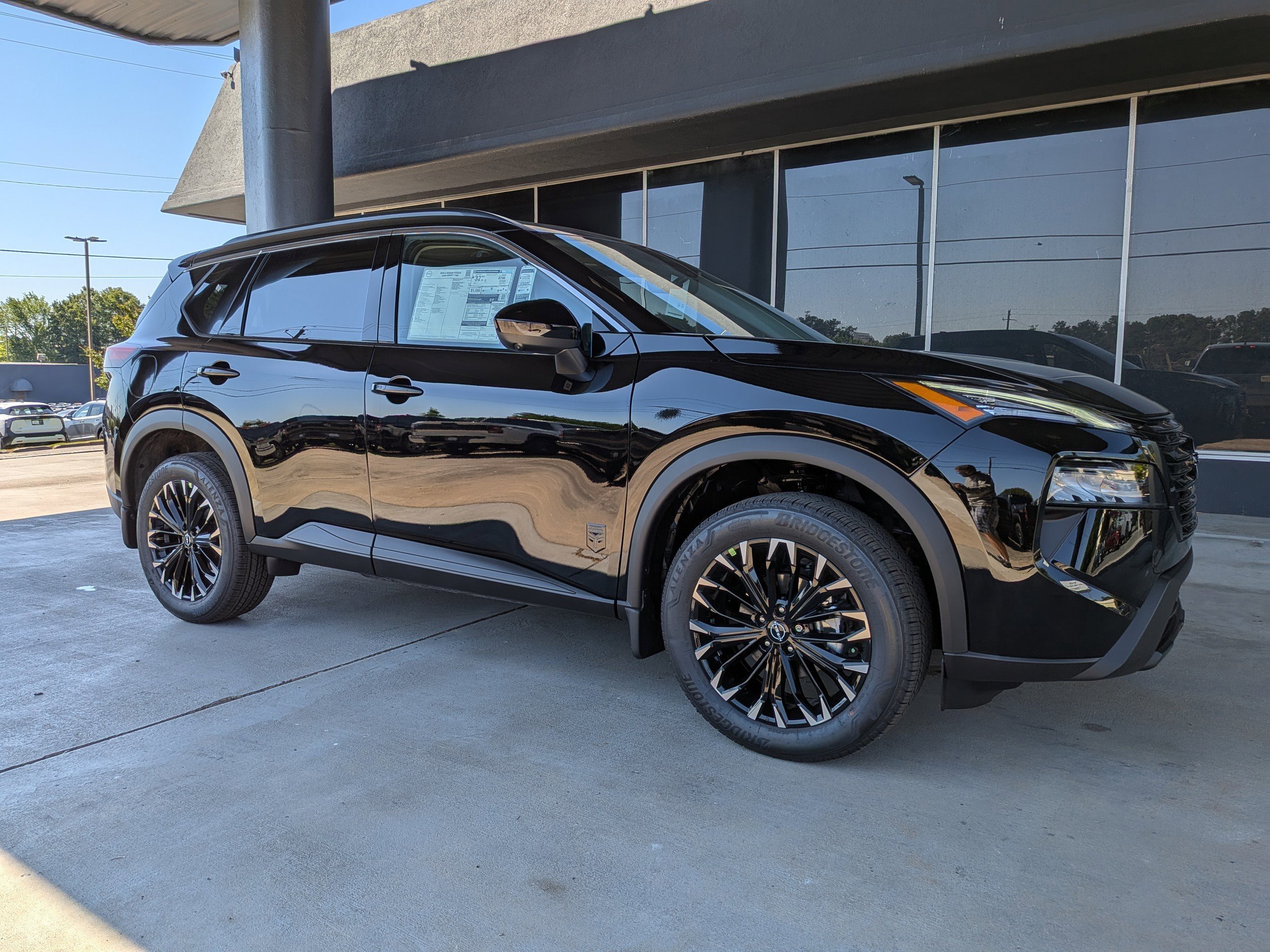 New 2026 Black Nissan Dark Armor image 1