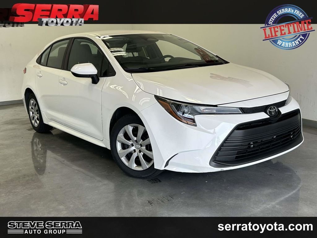 Used 2025 White Toyota LE image 1