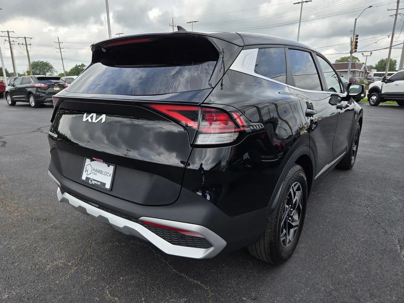 Used 2025 Ebony Black Kia LX image 5