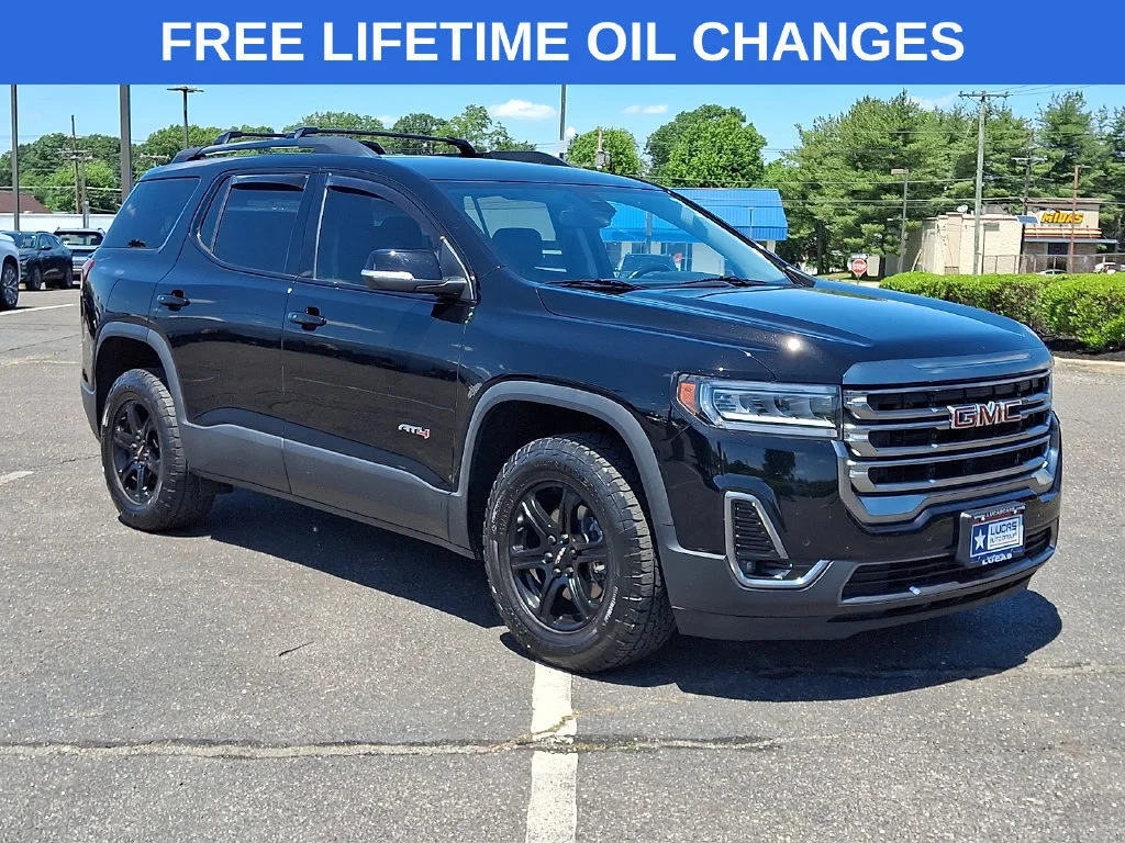 Used 2021 EBONY TWILIGHT METALLIC GMC AT4 image 1