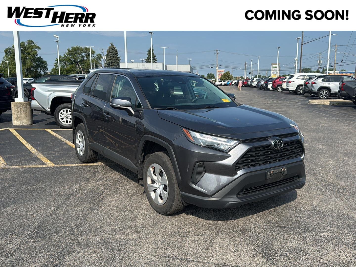 Used 2023 Magnetic Gray Metallic Toyota LE image 1