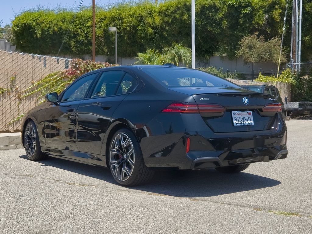 Used 2026 Black Sapphire Metallic BMW 550e xDrive image 25