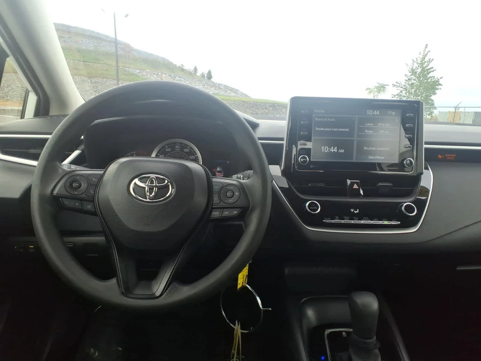 Used 2021 Super White Toyota LE image 14