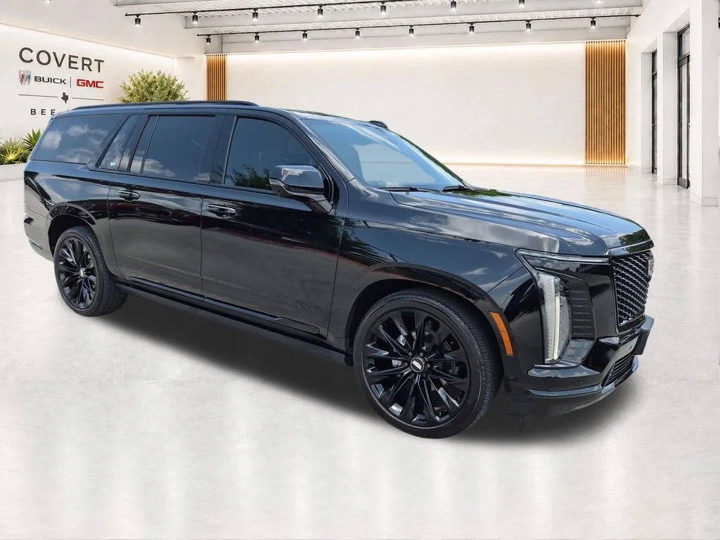 Used 2025 Black Cadillac Sport Platinum image 1