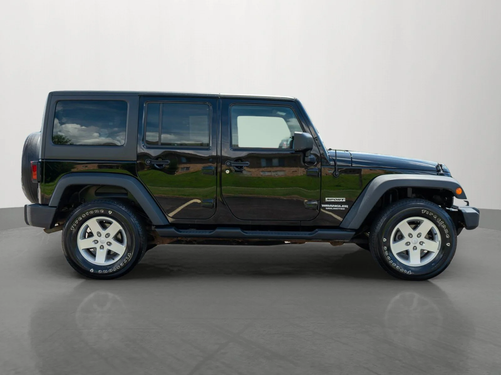Used 2012 Black Clearcoat Jeep Unlimited Sport image 8