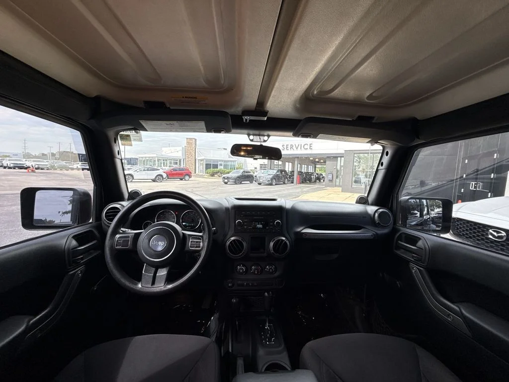 Used 2013 Black Jeep Unlimited Sport image 20