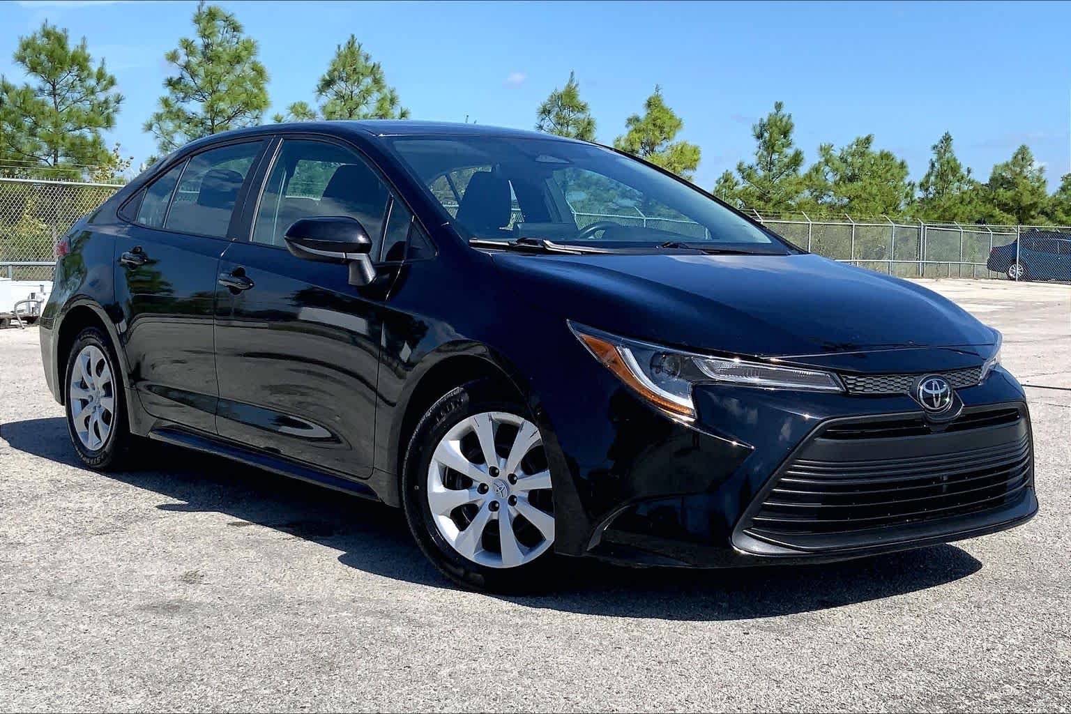 Used 2024 Midnight Black Metallic Toyota LE image 3