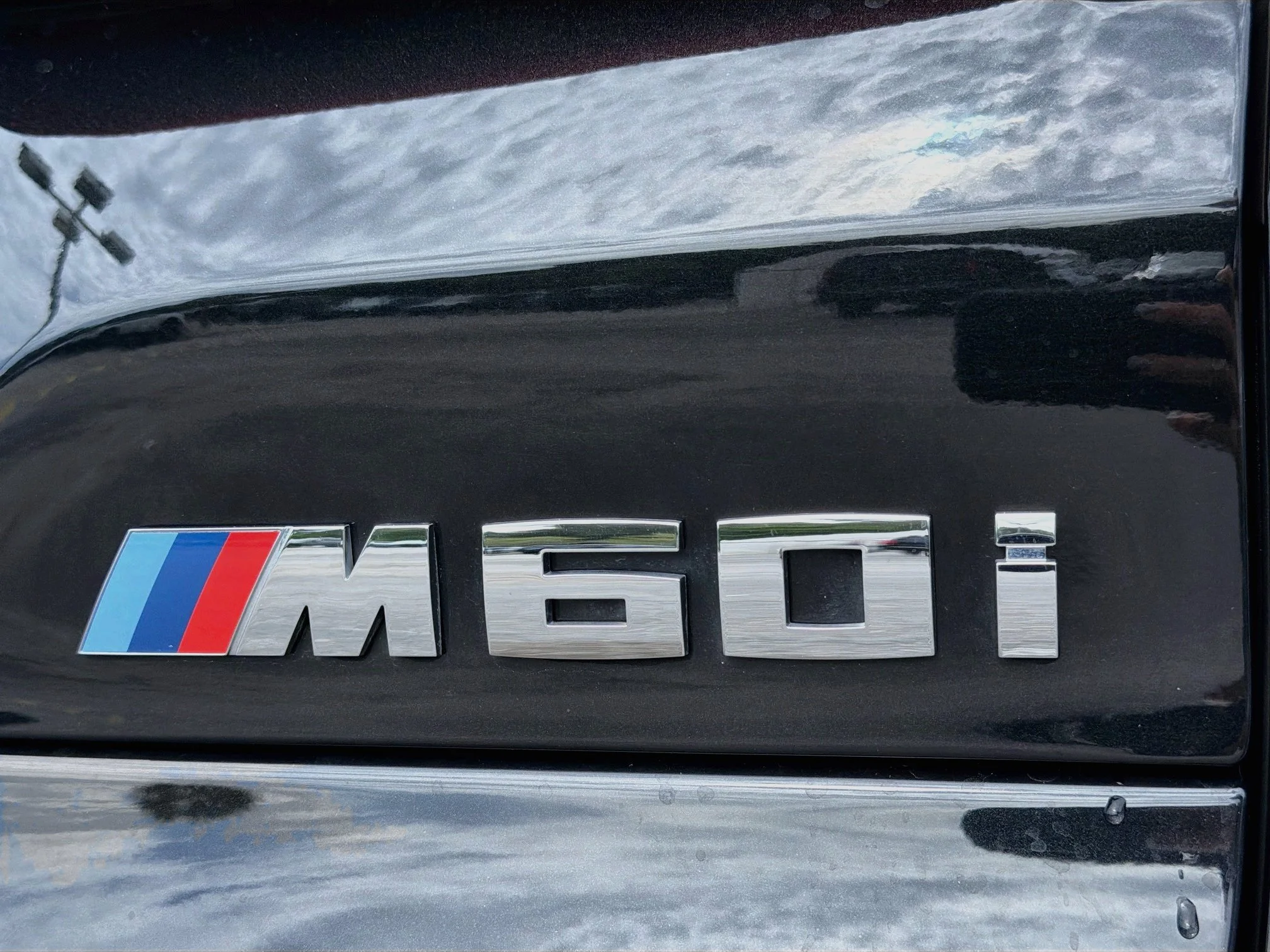 Used 2025 Black Sapphire Metallic BMW M60i image 11