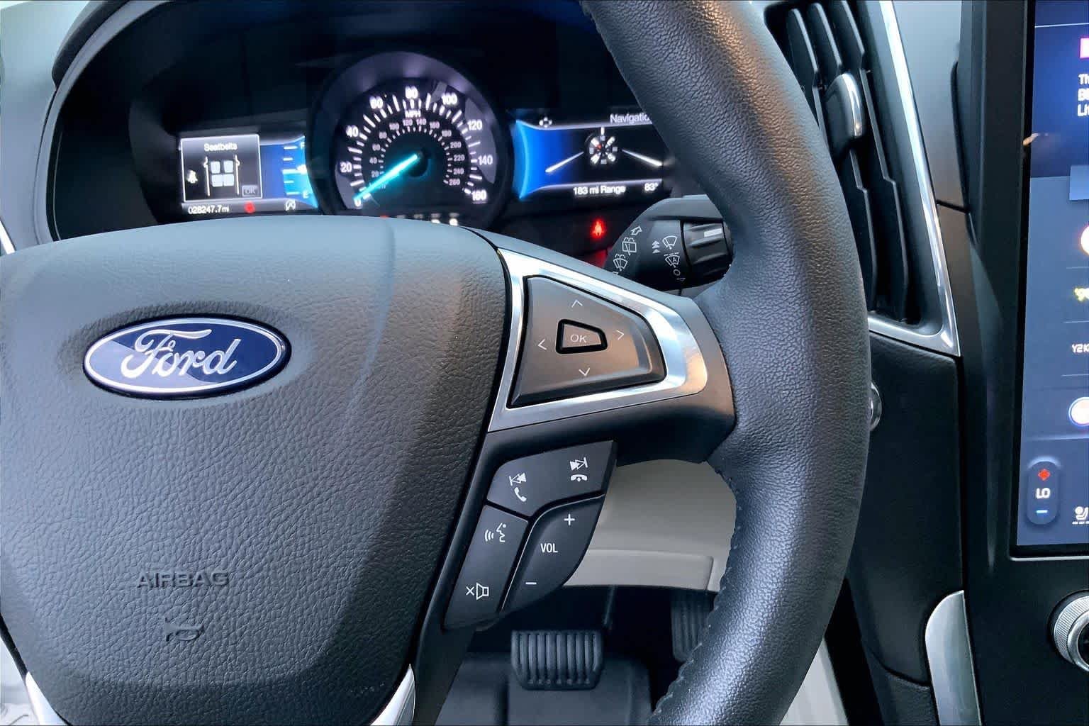 Used 2022 Star White Metallic Tri-Coat Ford Titanium image 24