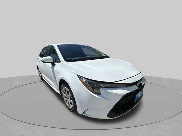 Used 2021 Super White Toyota LE image 7