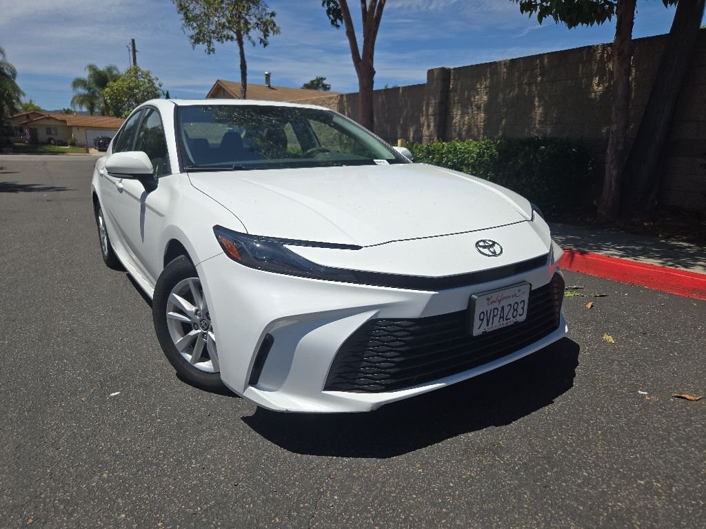 Used 2025 White Toyota LE image 1