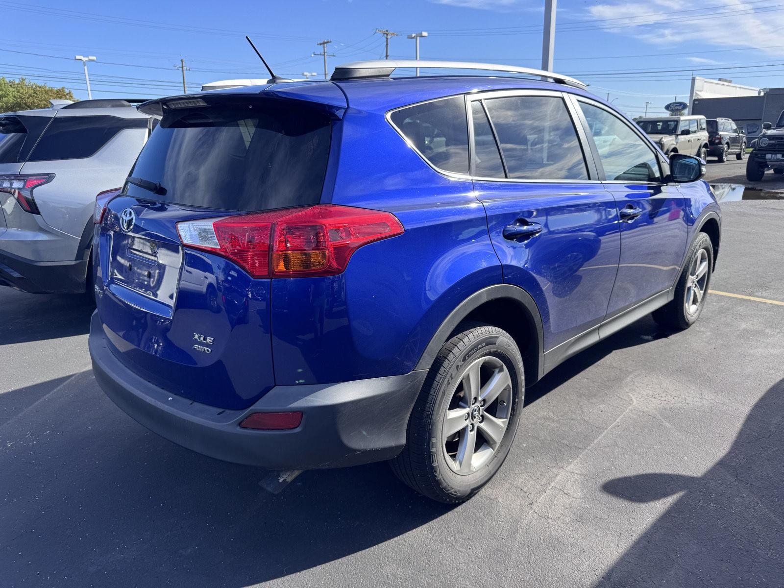 Used 2015 Blue Crush Metallic Toyota XLE image 3