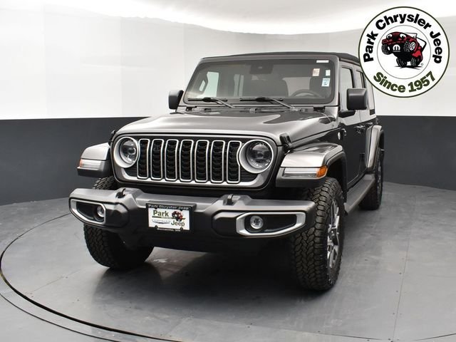 Used 2024 Jeep Wrangler 4-Door Sahara with VIN 1C4PJXEG4RW335475 for sale in Burnsville, Minnesota